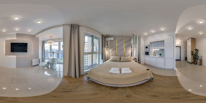 hdri 360 panorama view in interior of guest room studio in elite vip apartment with kitchen and bedroom with panoramic windows in equirectangular full spherical seamless projection, VR content
