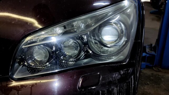  A close-up shot of a clean car headlight after detailing