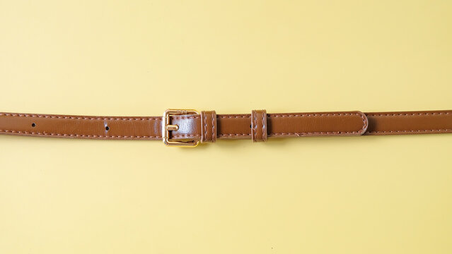 Vintage Brown Leather Belt with Brass Buckle for handbag.