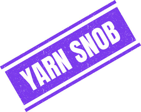 Purple rectangular rubber stamp showing the text yarn snob with a rustic and distressed texture finish