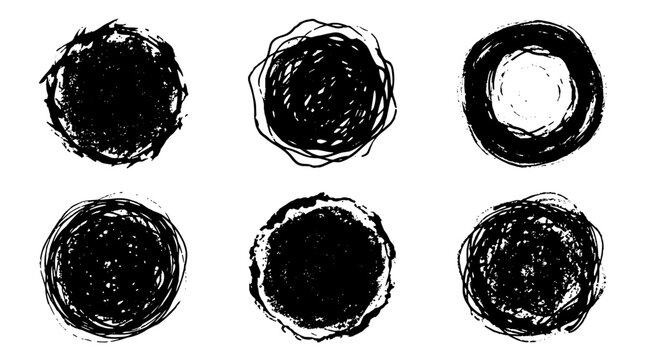 Set of six black grunge circles with rough edges and scribbled texture on white background