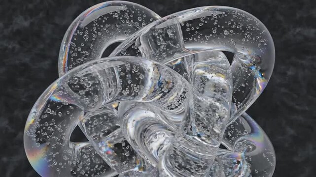 Intricate abstract sculpture composed of intertwined transparent glass-like tubes filled with tiny air bubbles and reflecting iridescent rainbow colors against a dark textured background creating a