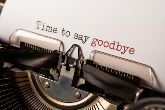 Close up of a vintage typewriter with the message Time to say goodbye printed on paper