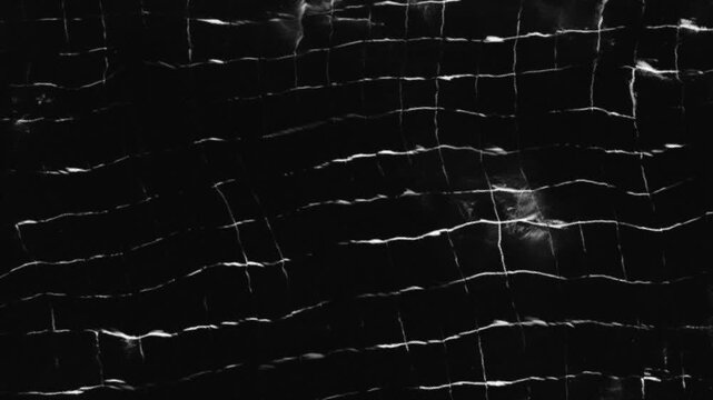 Abstract dark background with glowing horizontal crack patterns.