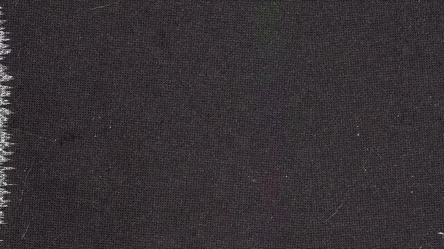 Old vintage film texture with static noise and flickering effect.