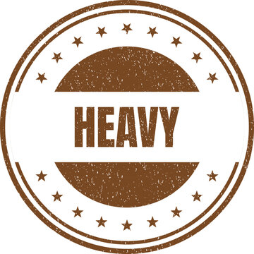 Circular vintage stamp with the word heavy printed in a bold brown font and stars