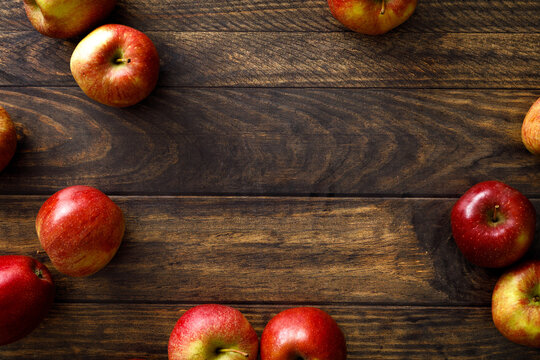 Apple. Ripe juicy red apple fruits with natural vitamins and antioxidant, healthy food, top view