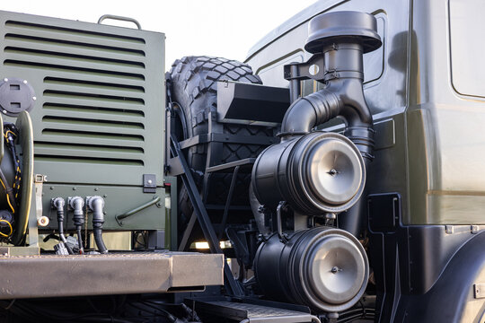 Military equipment and army equipment.. Detailed military transport imagery display. Close examination of armed forces cargo vehicle equipment. Focus on military transport showing tools