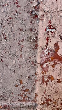 peeling paint texture background in beige, red and white with copy space