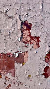 peeling paint texture background in beige, red and white with copy space