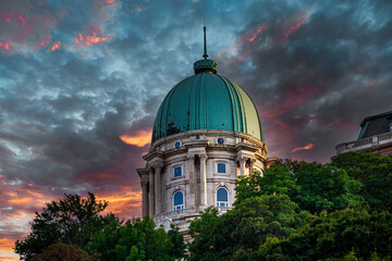 The dome of Buda Castle on a hilltop in Budapest, the capital of Hungary at sunset © Milan