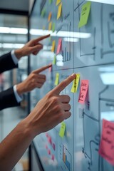 Obraz premium Diverse business team brainstorming in modern office with digital whiteboard, POINTING NOTE PAD.
