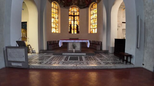 Cinematic view of the historic altar inside the Basilica of San Giovanni a Porta Latina in Rome