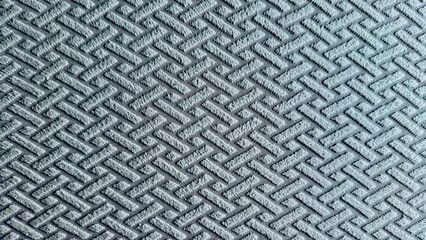 textured slate blue fabric showcases geometric basketweave pattern creating soothing tactile depth for modern interior design © Arthur