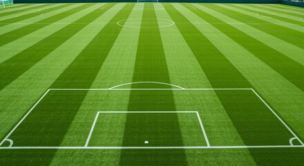 Obraz premium Aerial View of a Football Pitch with Unique Grass Patterns and Central Marking in Green Shades