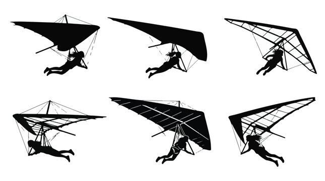 Silhouettes of hang gliders in various flight positions