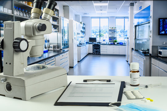 Microscope and PCR report in antiviral research laboratory