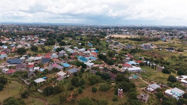 Dar Es Salaam Tanzania - 26 June 2026 - Aerial view of Kigamboni Dar es Salaam showcasing residential settlements houses green landscapes and expanding urban development in Tanzania