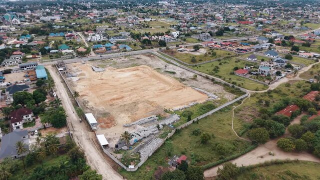 Dar Es Salaam Tanzania - 26 June 2026 - Aerial view of Kigamboni Dar es Salaam showcasing residential settlements houses green landscapes and expanding urban development in Tanzania