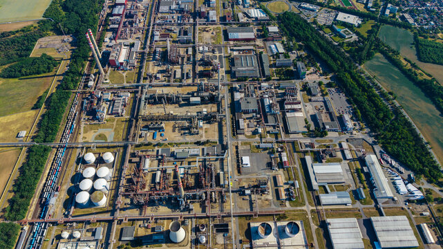 Aerial view of the Unipetrol RPA refinery complex with industrial structures, storage tanks, and cooling towers in Kralupy nad Vltavou, Stredocesky kraj, Czechia.