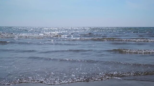 Peaceful Tropical Beach with Small Waves and Ocean Horizon &ndash; 4K Stock Video