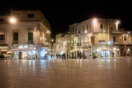 Night view of square \ plaza in Ostuni Italy