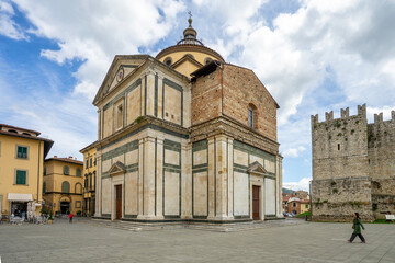 Fototapeta premium Prato, Italy - Basilica of Santa Maria delle Carceri and part of the Castello dell'Imperatore in the historic center of Prato, Tuscany, Italy.