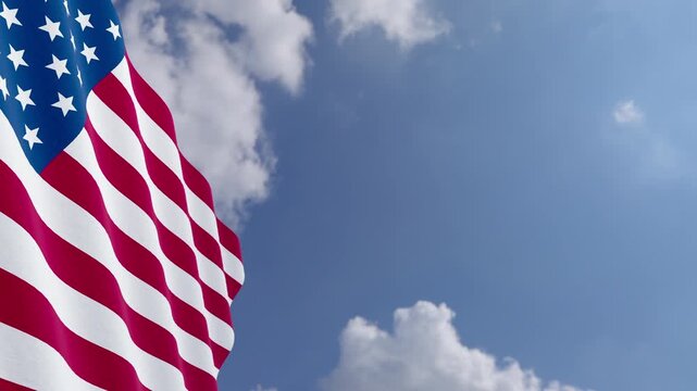 Seamless Loop of American Flag Waving with Copy Space Against Blue Sky and Clouds