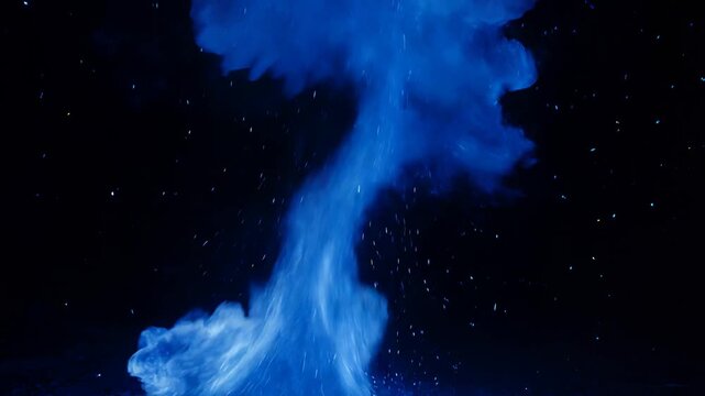High Contrast Slow Motion Of Electric Blue Fire And Ionized Energy Particles Floating In Space