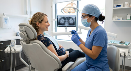 Obraz premium Pregnant woman during a routine checkup at a modern dental clinic