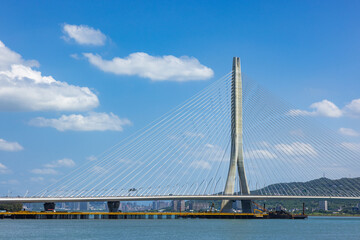 Obraz premium Danjiang Bridge in Tamsui Taiwan with blue sky