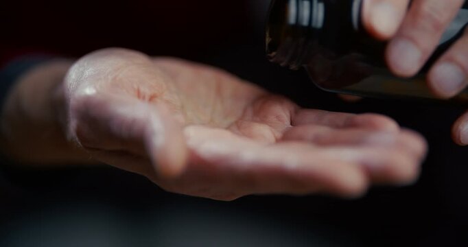 Open Human Palm Isolated on Dark Background in Soft Light