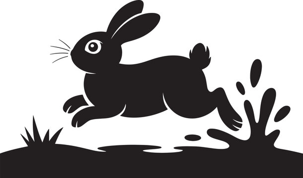 Black silhouette of a cute rabbit jumping over a puddle in a meadow