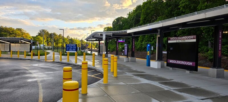 Middleborough commuter rail station platform at sunset showcasing urban serenity and modern public transport architecture