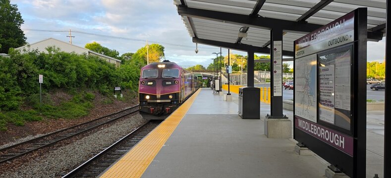 Modern MBTA Commuter Rail Train Arriving at Middleborough Station Platform Representing Public Transportation and Daily Travel