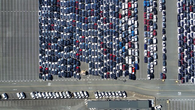 Top Down Aerial View of Massive Vehicle Storage Lot and New Car Distribution Facility