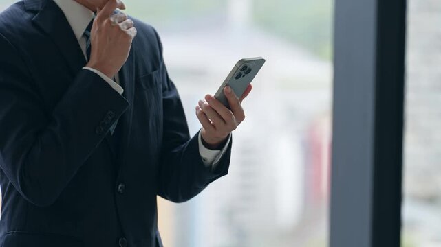 Business people who use smartphones in the office