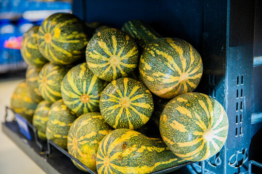 Fresh Green Pumpkins at Market Stall