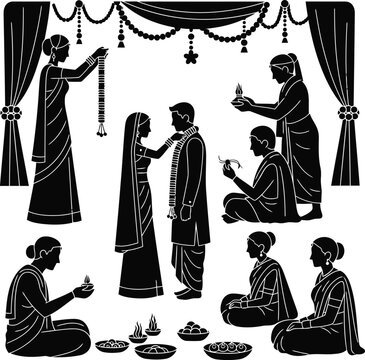 Black silhouette of Hindu religious ceremony with people performing prayer and aarti with lamps and offerings