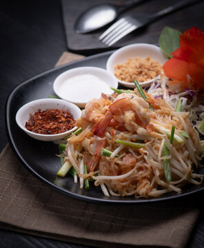 Traditional Thai stir-fried rice noodles Pad Thai with shrimp.