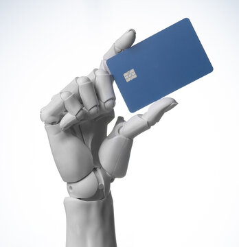 Robotic hand holding blank blue credit card isolated on white background.