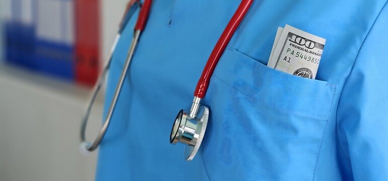Doctor putting dollar bill in his coat pocket 4k movie slow motion.