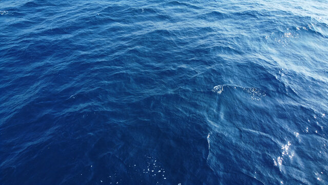 Ultra Realistic Aerial Top View of Deep Blue Ocean Surface with Natural Water Ripples and Seamless Marine Texture Background