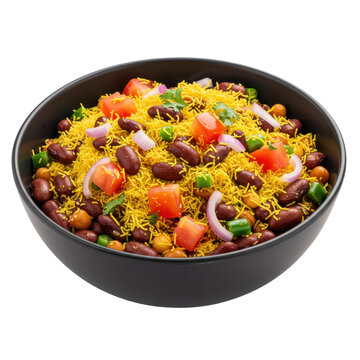 Colorful indian bhel puri snack in black bowl with tomatoes and onions isolated on white background