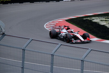 Obraz premium May 24, 2026, Montreal, Canada - Haas Formula 1 car on track by Ocon and Bearman at Circuit Gilles Villeneuve. g.