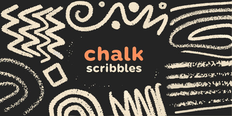 Chalk scribbles and doodle patterns on a dark gray background © Sujal