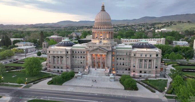 Evening lighting illuminates the capitol's facade