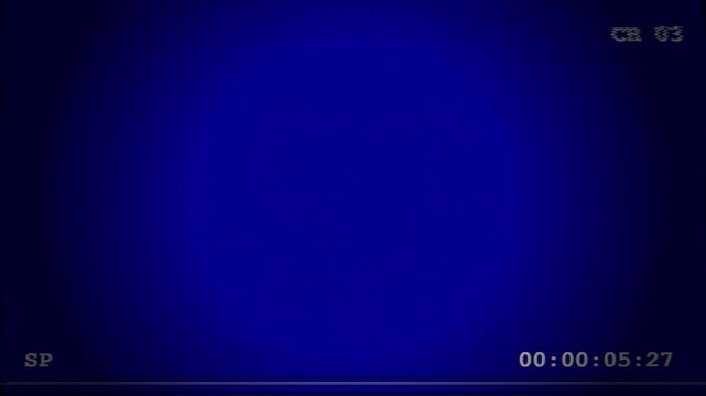Vintage vhs video cassette recorder screen with blue background and timecode overlay