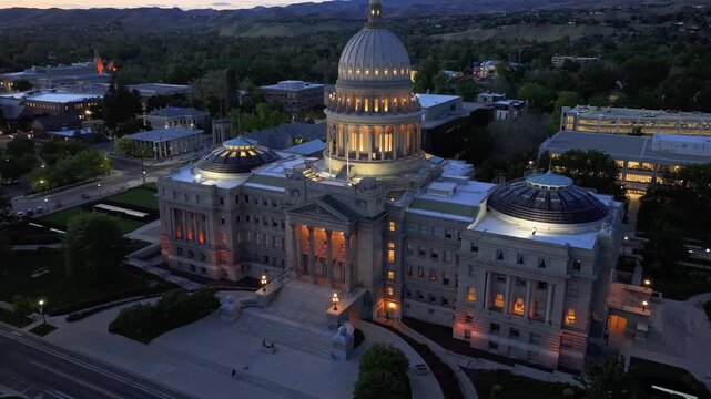 Sunset lights the capitol building's dome