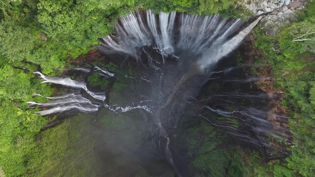 Amazing aerial view Tumpak Sewu waterfall in the morning on Java island, Indonesia.
